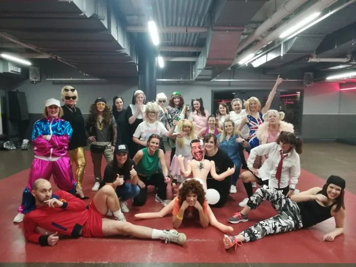 90s hen party dance class in Bournemouth group mid-routine