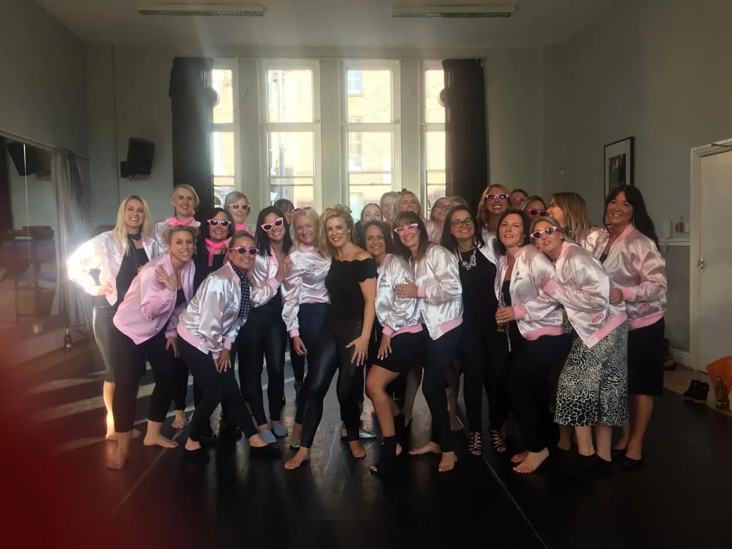Grease hen party dance class in Bournemouth group mid-routine