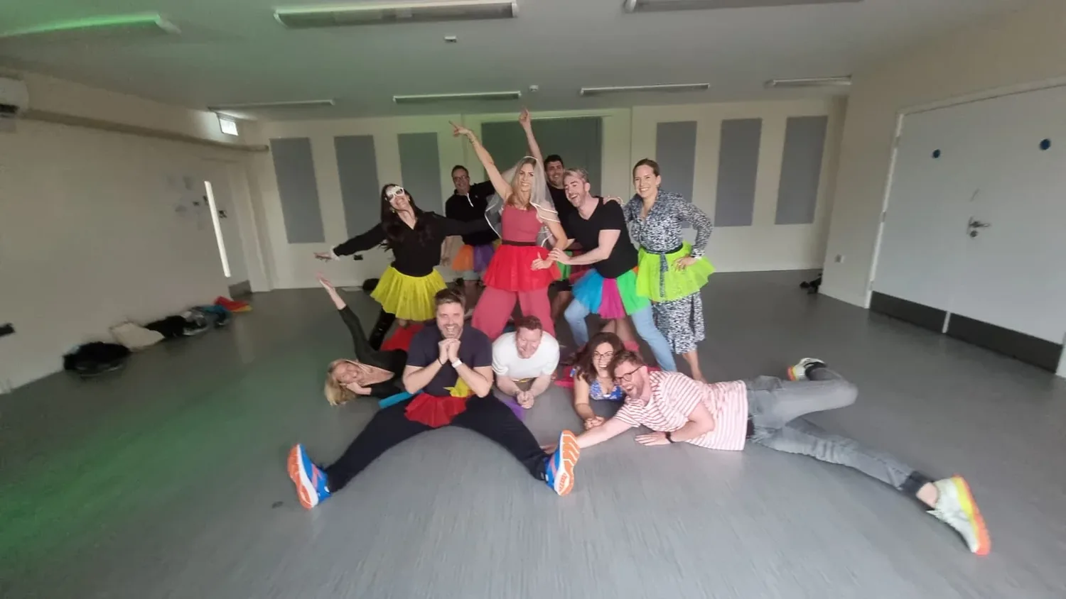 2000s hen party dance class in Bournemouth group mid-routine