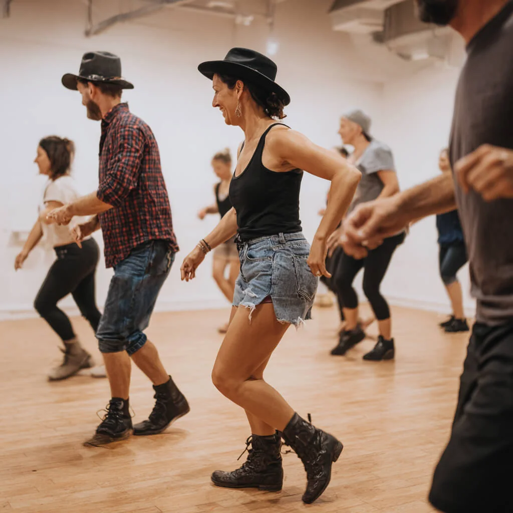 Adults line dancing in rows at a weekly class in Bournemouth
