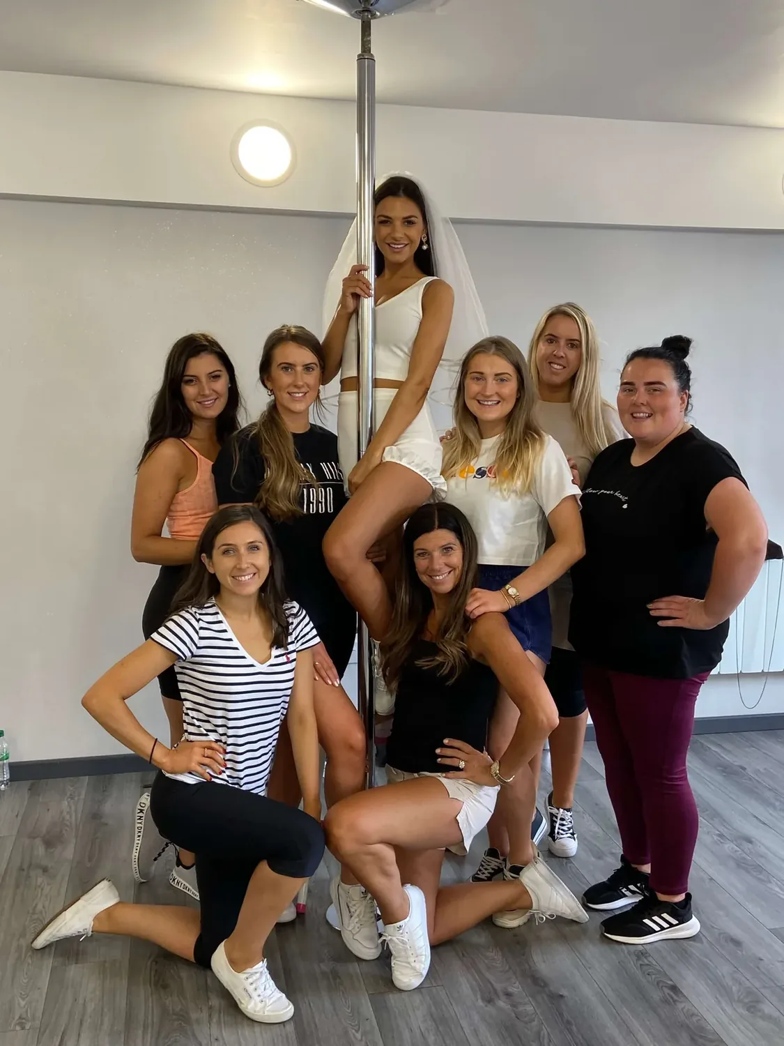 Pole dancing hen party class Bournemouth in a studio